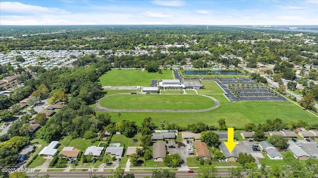 birds eye view of property featuring a residential view and a water view