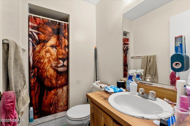 bathroom with vanity and toilet