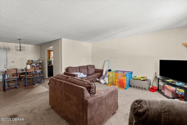 living area with a textured ceiling and an inviting chandelier