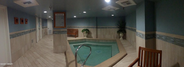 view of pool featuring a community hot tub