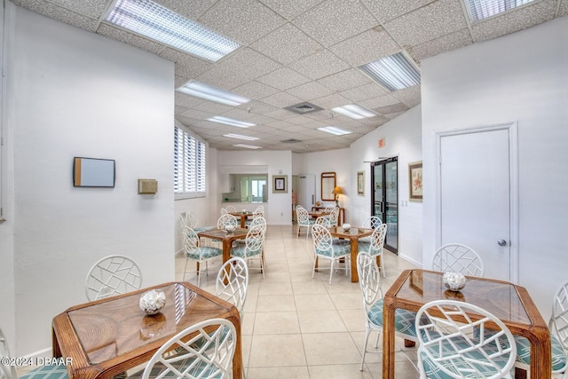 3023 S Atlantic Ave Unit 7070, Daytona Beach, FL 32118 - dining room with a paneled ceiling and light tile patterned floors