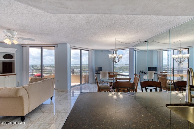 3023 S Atlantic Ave Unit 7070, Daytona Beach, FL 32118 - dining room with a chandelier, light marble finish flooring, and a textured ceiling