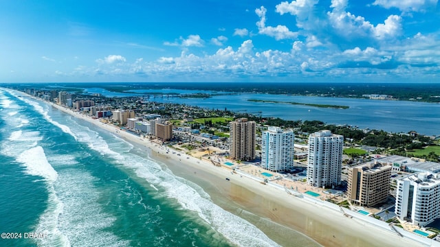 drone / aerial view with a view of the beach and a water view