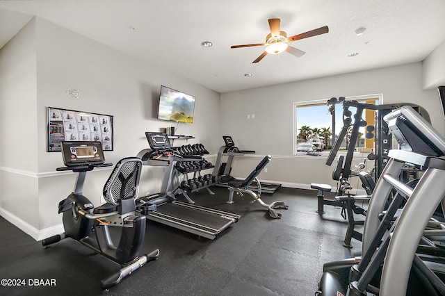 workout area with ceiling fan