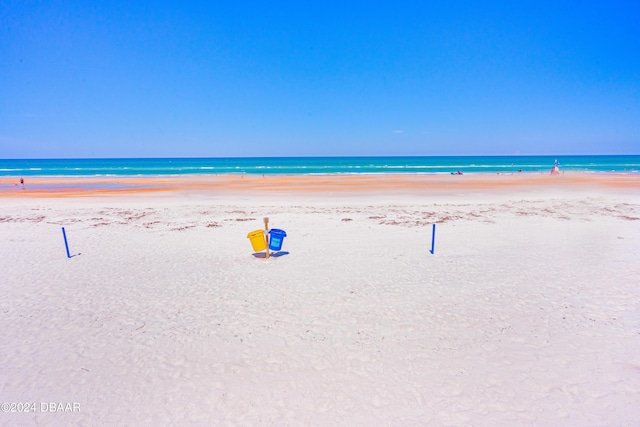 property view of water featuring a view of the beach