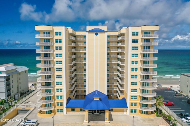 view of building exterior with a water view