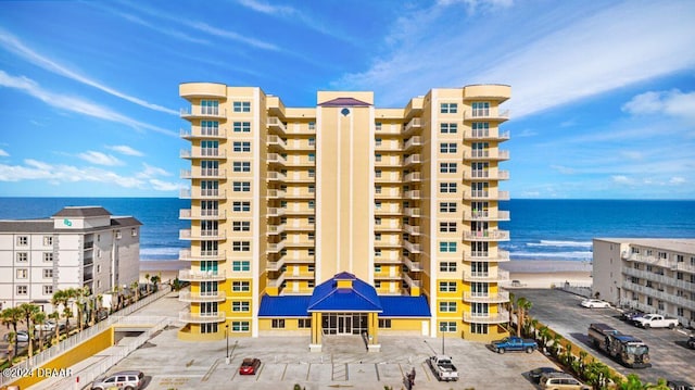 view of building exterior with a water view