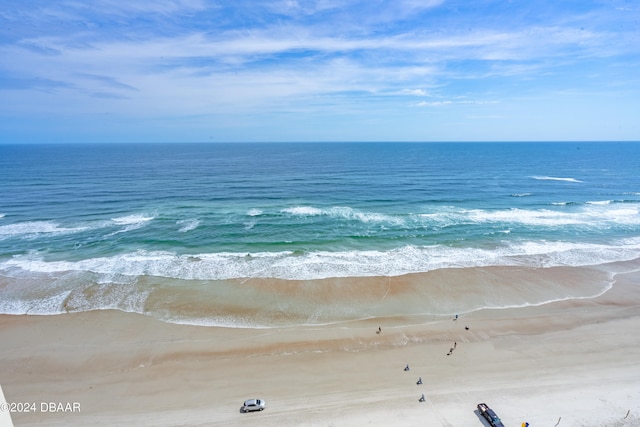 view of water feature with a beach view