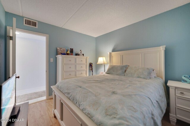 bedroom featuring light hardwood / wood-style floors