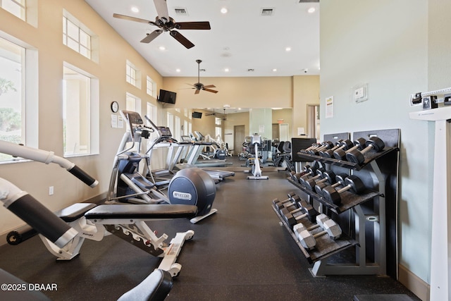 exercise room with plenty of natural light, visible vents, and recessed lighting