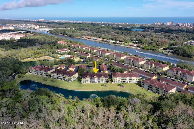 aerial view with a residential view and a water view