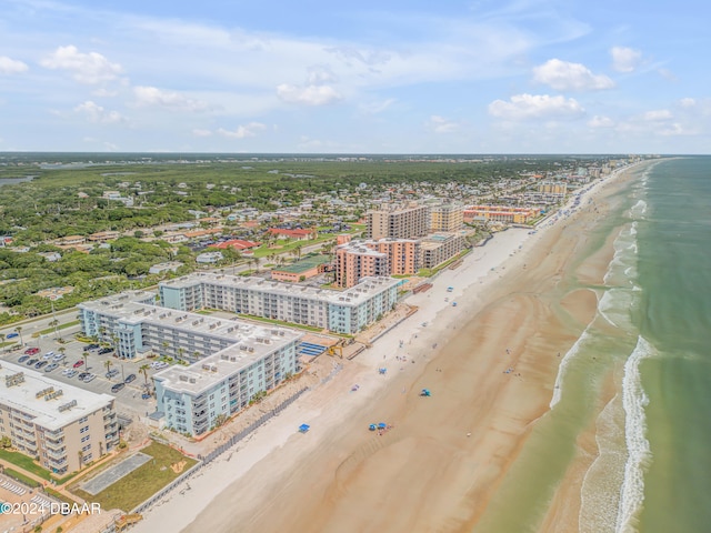 bird's eye view featuring a beach view and a water view