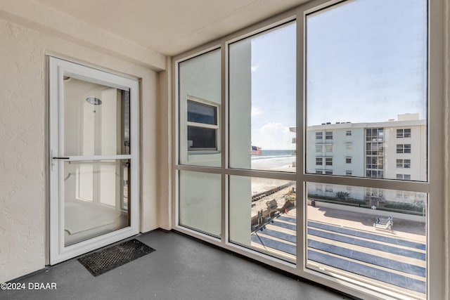 doorway featuring concrete flooring