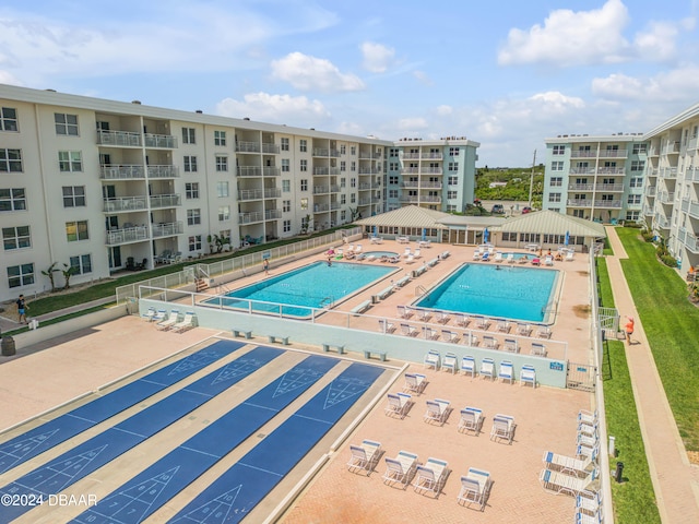 view of swimming pool with a patio