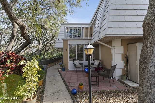 view of patio / terrace featuring a balcony