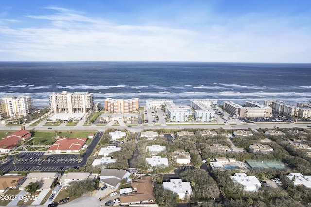 aerial view featuring a view of city and a water view