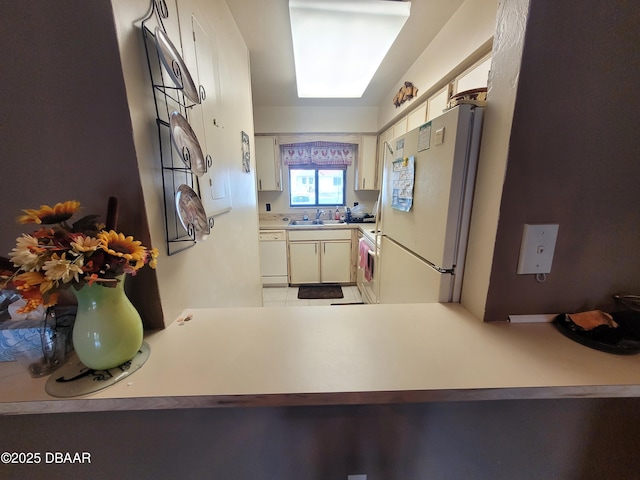 3557 Forest Branch Dr Unit B, Port Orange, FL 32129 - kitchen with white appliances and light countertops