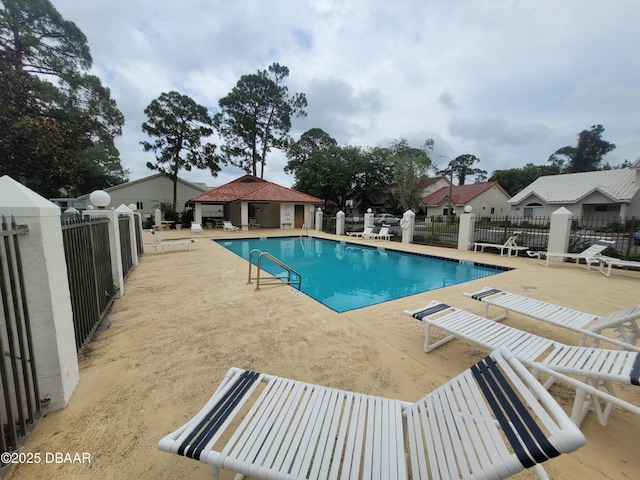 3557 Forest Branch Dr Unit B, Port Orange, FL 32129 - community pool featuring a patio area