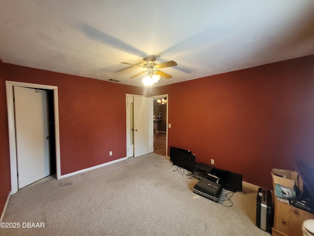3557 Forest Branch Dr Unit B, Port Orange, FL 32129 - unfurnished bedroom featuring light colored carpet and ceiling fan