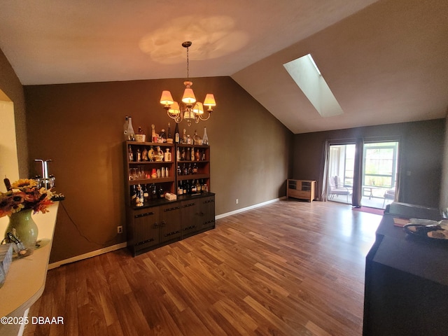 3557 Forest Branch Dr Unit B, Port Orange, FL 32129 - dining space featuring wood finished floors, a chandelier, lofted ceiling, a skylight, and heating unit