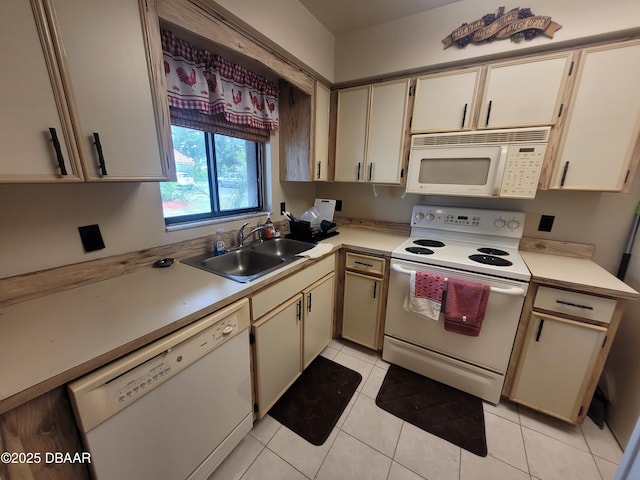 3557 Forest Branch Dr Unit B, Port Orange, FL 32129 - kitchen featuring white appliances, light countertops, and light tile patterned floors