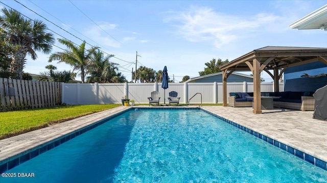 view of swimming pool featuring a fenced in pool, a fenced backyard, an outdoor hangout area, a gazebo, and a patio area