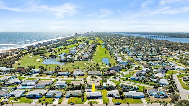 birds eye view of property featuring a water view, a residential view, and golf course view