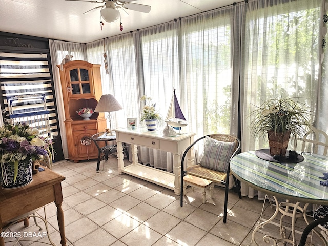 sunroom / solarium with ceiling fan