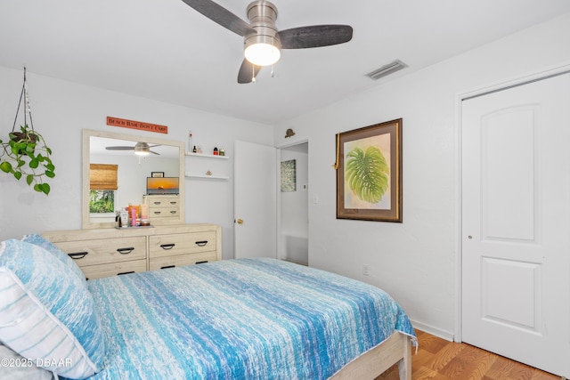 bedroom with ceiling fan and light wood-type flooring