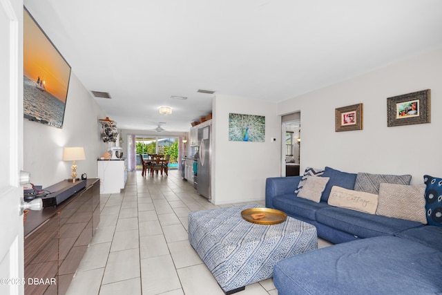 living room with light tile patterned floors