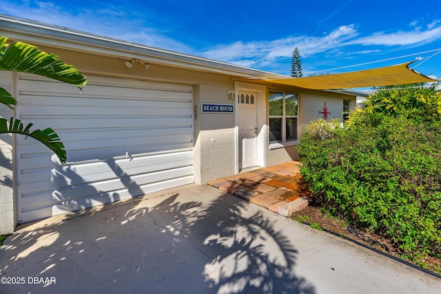 property entrance with a garage