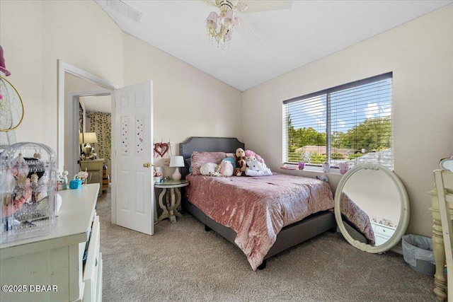 21 Whittingham Ln, Palm Coast, FL 32164 - bedroom with light colored carpet, ceiling fan, and vaulted ceiling