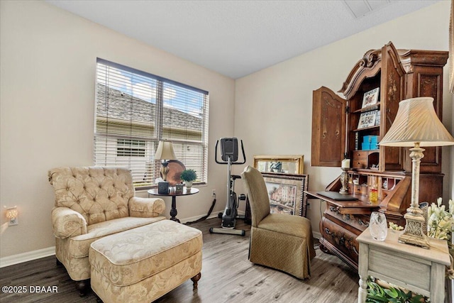 21 Whittingham Ln, Palm Coast, FL 32164 - sitting room with wood finished floors and baseboards