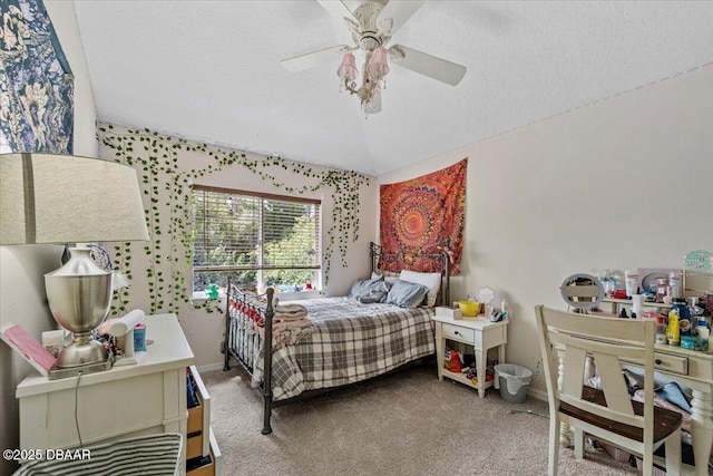 21 Whittingham Ln, Palm Coast, FL 32164 - carpeted bedroom with lofted ceiling, baseboards, a textured ceiling, and ceiling fan
