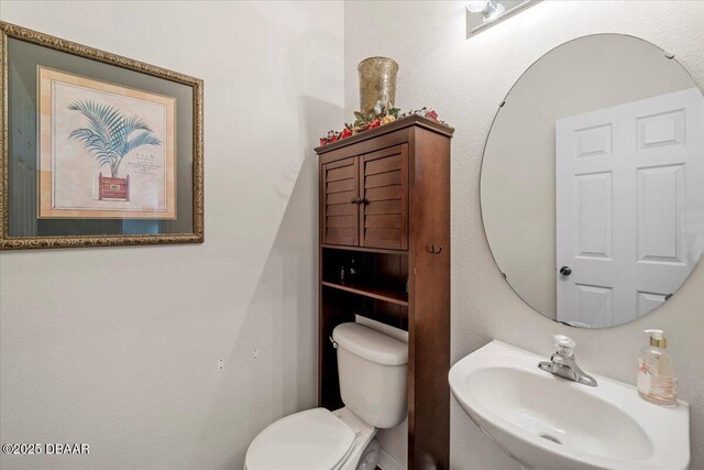 21 Whittingham Ln, Palm Coast, FL 32164 - half bath with toilet and a sink