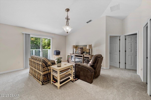 21 Whittingham Ln, Palm Coast, FL 32164 - living room with light carpet, baseboards, visible vents, and vaulted ceiling