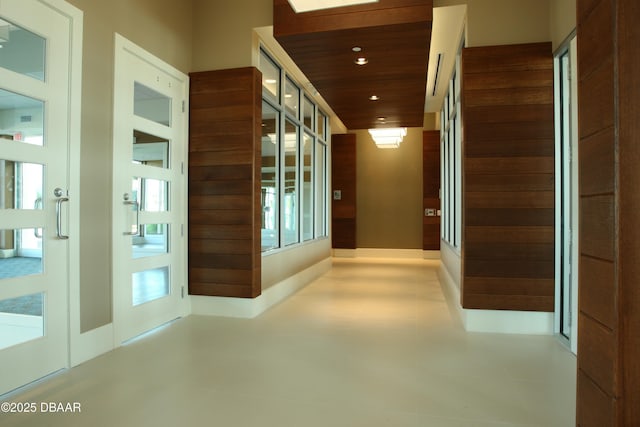 hall featuring recessed lighting