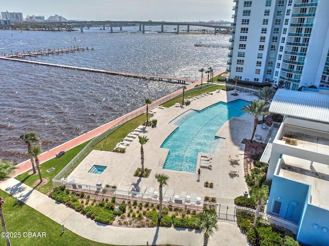 drone / aerial view with a water view and a city view