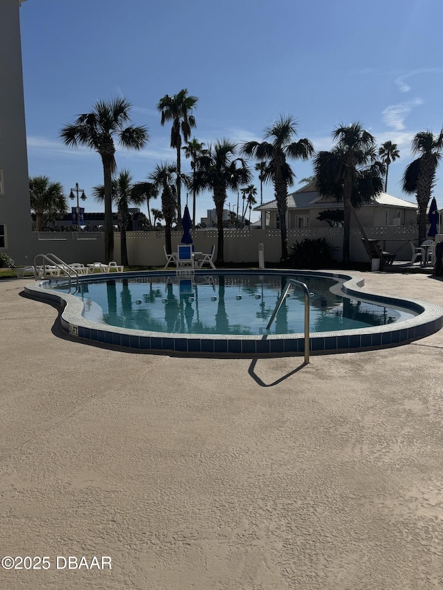 view of pool with a patio area