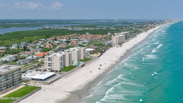 bird's eye view featuring a beach view and a water view