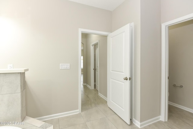 bathroom with tile patterned flooring