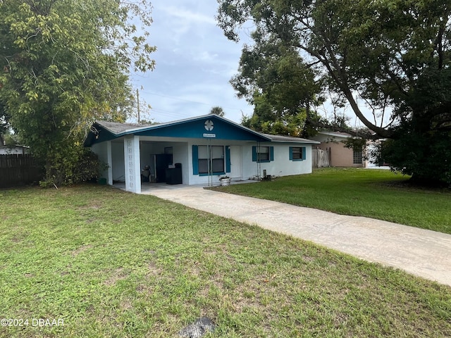 single story home featuring a front yard