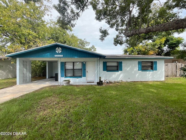 single story home with a front yard