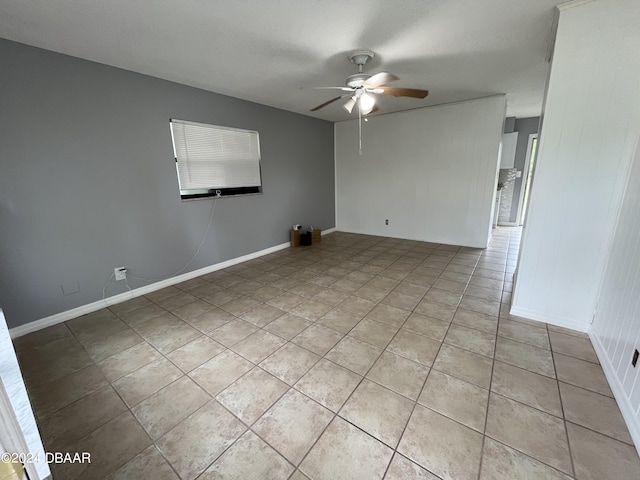506 Cambridge Cir S, Daytona, FL 32119 - spare room featuring a ceiling fan and light tile patterned floors