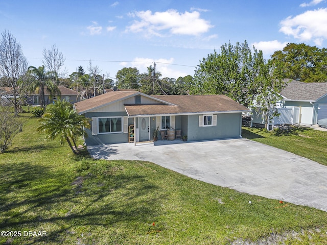 single story home featuring a front lawn, roof with shingles, and fence