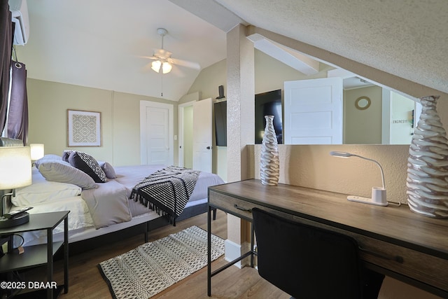 bedroom with vaulted ceiling and dark hardwood / wood-style floors