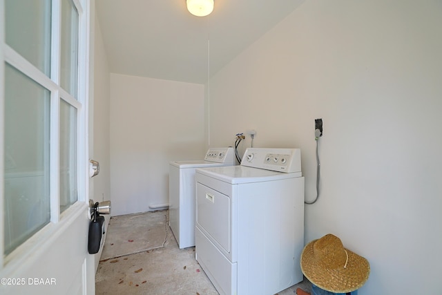 laundry room featuring washing machine and clothes dryer