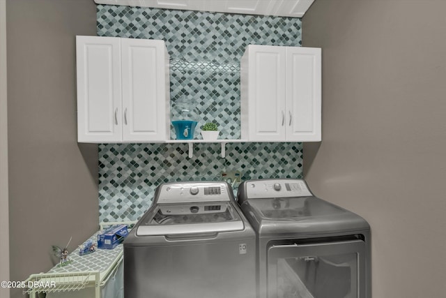 1767 Travertine Ter, Sanford, FL 32771 - clothes washing area featuring cabinet space and washing machine and clothes dryer