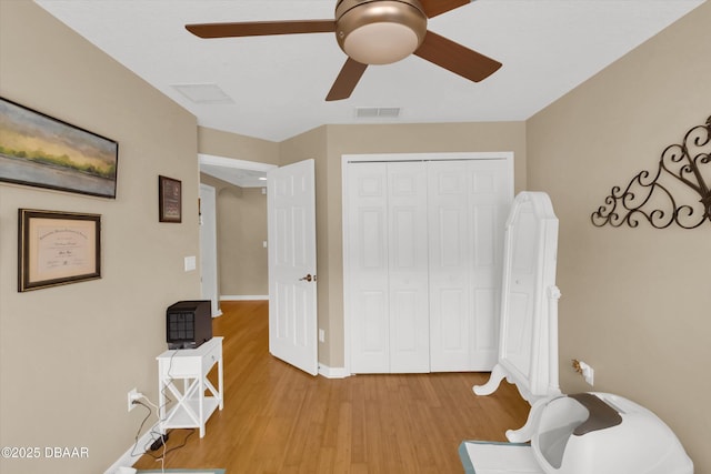 1767 Travertine Ter, Sanford, FL 32771 - bedroom with a closet, light wood-type flooring, ceiling fan, baseboards, and visible vents