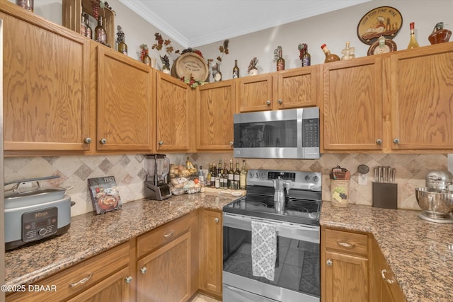 1767 Travertine Ter, Sanford, FL 32771 - kitchen featuring ornamental molding, stainless steel appliances, and decorative backsplash